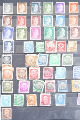 Lot 226 - World, a collection of stamps housed in three...
