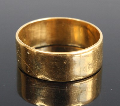 Lot 261 - A modern 22ct gold wedding band, sponsor WW...
