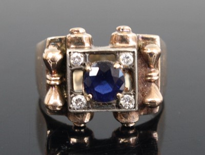 Lot 263 - A yellow metal sapphire and diamond dress ring,...