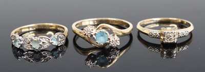 Lot 264 - A 9ct gold blue topaz and diamond point set...