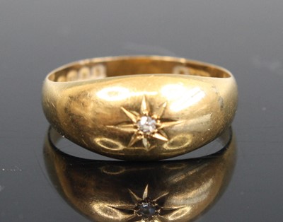 Lot 267 - An 18ct gold diamond band ring, gypsy set,...