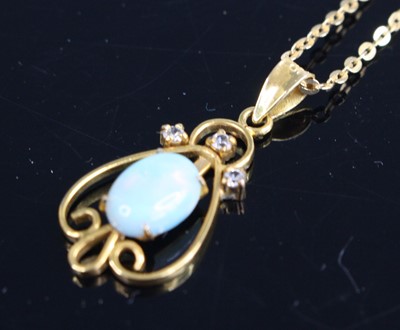 Lot 291 - A 14ct gold opal and diamond point set pendant...
