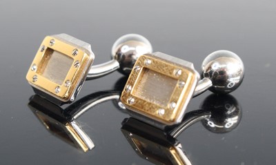 Lot 300 - A pair of Cartier Santos steel and 18ct gold...