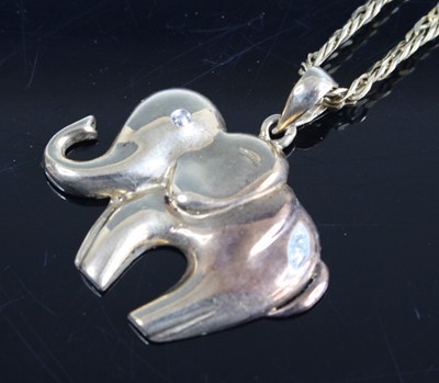 Lot 302 - A 9ct gold elephant pendant on 9ct gold flat...