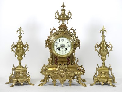 Lot 68 - An early 20th century French brass three piece...
