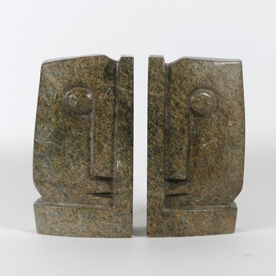 Lot 19 - A pair of African polished hardstone bookends,...