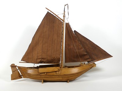 Lot 62 - A wooden model of a Dutch barge, on stand, h.67cm