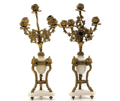 Lot 59 - A pair of gilt spelter and marble candlesticks,...