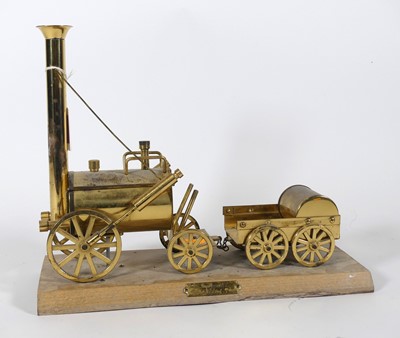 Lot 10 - A brass model of Stephenson's Rocket, on...