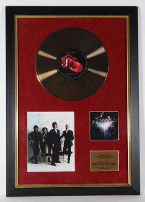 Lot The Rolling Stones, a CD gold disc for the...
