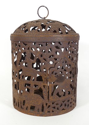 Lot 55 - A wrought iron candle lantern, having a...