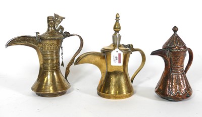 Lot 69 - A copper Dallah coffee pot, with typical...