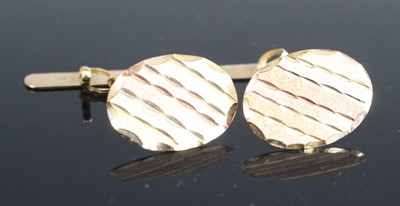 Lot 252 - A pair of gentleman's 9ct tri-colour gold cuff-...