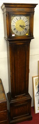 Lot 1103 - An early 20th century oak longcase clock,...
