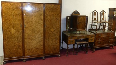 Lot 1104 - A 1930s walnut and figured walnut bedroom...