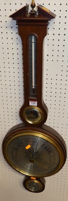 Lot 1108 - A contemporary mahogany three-dial wheel...