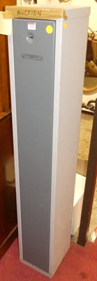 Lot 1110 - A contemporary steel single door gun safe...
