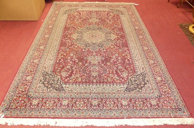 Lot 1115 - A Turkish machine woven Gulendam red and blue...
