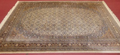 Lot 1117 - A Persian woollen cream and blue ground Shiraz...