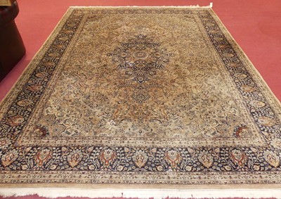 Lot 1118 - A Persian woollen cream and blue ground Tabriz...