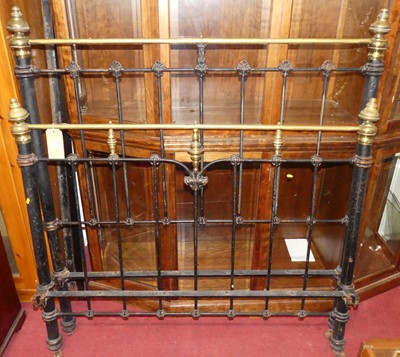 Lot 1154 - A Victorian black painted cast iron and brass...