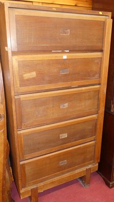 Lot 1156 - A Stavertons Government Issue oak five-door...