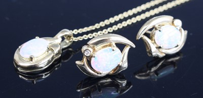 Lot 255 - A modern 9 carat gold and opal cabochon set...