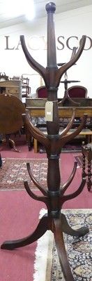 Lot 1163 - A 19th century mahogany tiered hat stand,...