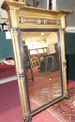 Lot 1165 - A Regency gilt wood pier mirror, having half...