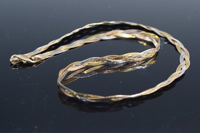 Lot 322 - A ladies 9 carat tri-colour gold flat link...