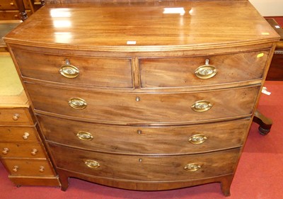 Lot 1178 - A Regency mahogany bowfront chest of two short...