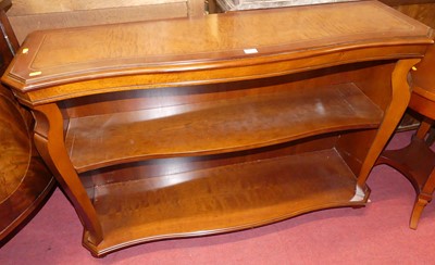 Lot 1187 - A contemporary walnut low serpentine front...