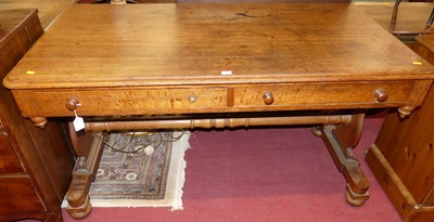 Lot 1200 - A mid-Victorian oak round cornered two drawer...