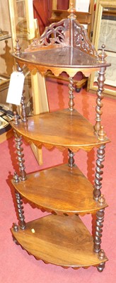 Lot 1204 - An early Victorian rosewood four-tier bowfront...