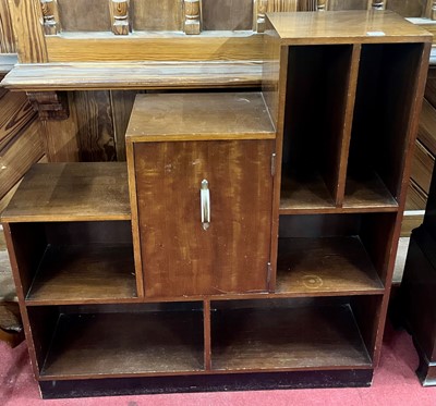 Lot 1106 - An Art Deco walnut stepped bookshelf, having...