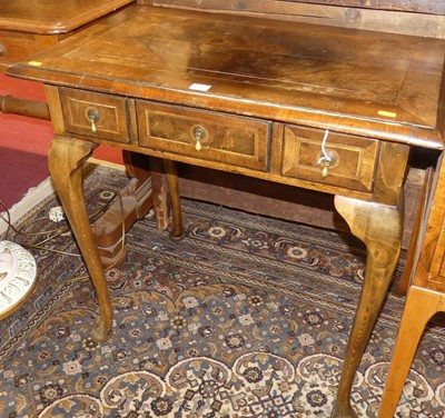 Lot 1214 - A Georgian style walnut cross and feather...