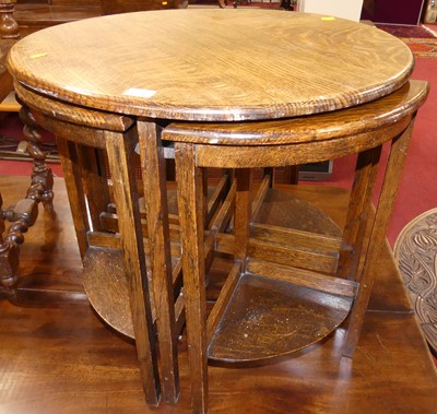 Lot 1221 - A 1930s oak circular nest of five occasional...