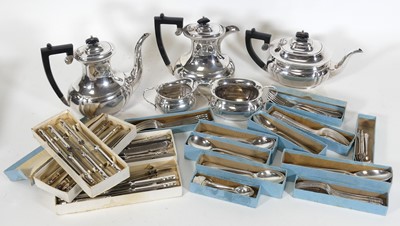 Lot 133 - A silver plated four piece tea set, together...
