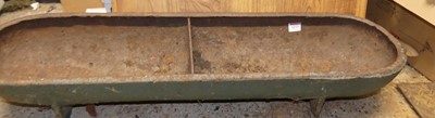 Lot 1273 - An agricultural cast iron twin feeding trough,...