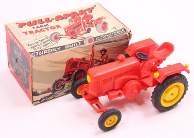 Lot 975 - Rex Toys Pull Apart plastic Farm tractor, in...