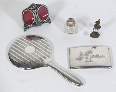 Lot 222 - A George V silver backed hand mirror, together...