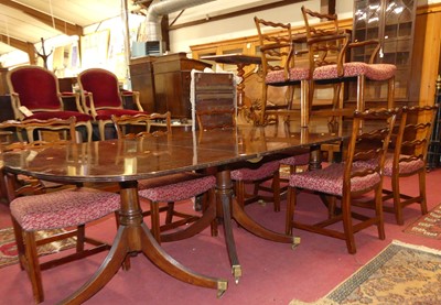 Lot 1236 - A Regency style mahogany triple pillar dining...