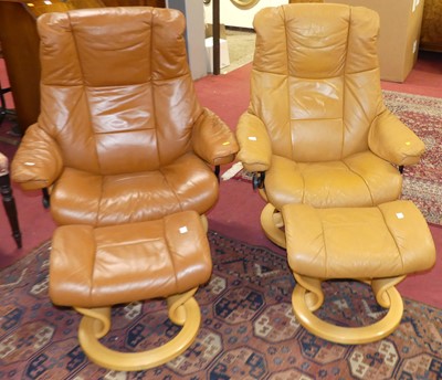 Lot 1251 - A pair of contemporary Stressless tan leather...