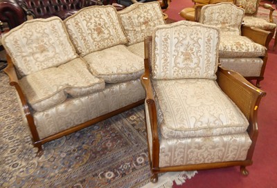 Lot 1256 - A 1930s walnut and double split cane...