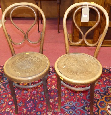 Lot 1259 - A pair of early 20th century bentwood panelled...