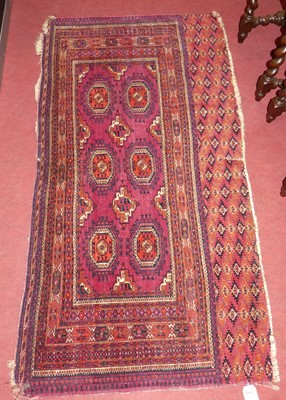 Lot 1271 - A Persian red ground woollen Bokhara rug, 162...