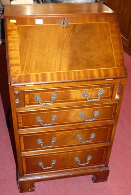 Lot 1291 - A contemporary mahogany narrow slopefront four...