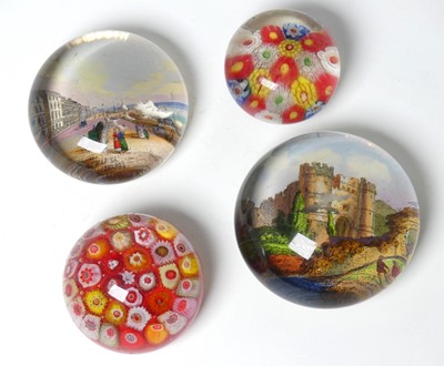 Lot 356 - A glass paperweight, reverse decorated with...