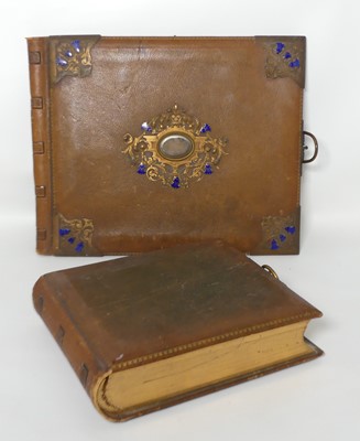 Lot 378 - A Victorian tan leather photograph album,...