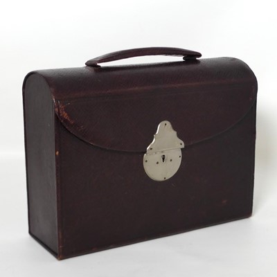 Lot 390 - A burgundy leather travelling stationery box,...